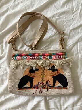 Beige Embroidered Fringe Crossbody Bag with Egyptian Cat Motif